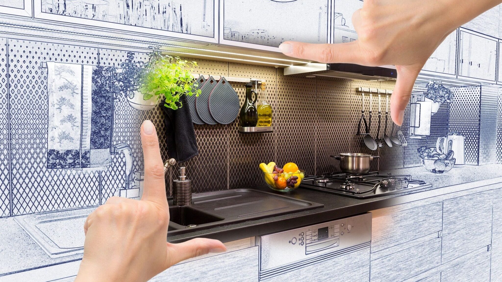 Stretched out pointer finger and thumbs create a rectangle to show an updated portion of a kitchen while the outside area is unfinished.